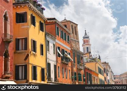 Facades of the houses on the street in Venice, Italy