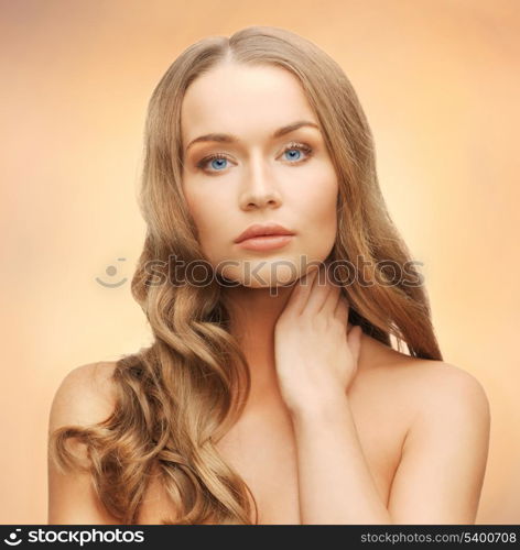 face and hands of beautiful woman with long hair