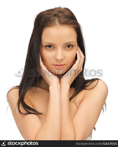 face and hands of beautiful woman with long hair