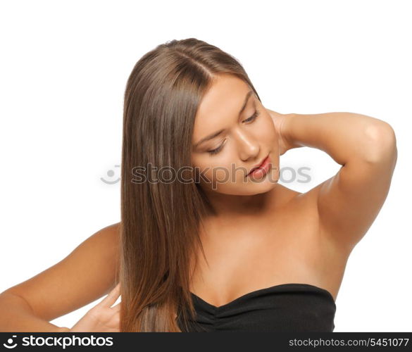 face and hands of beautiful woman with long hair