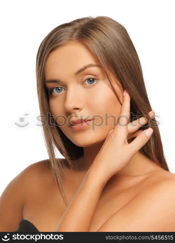 face and hands of beautiful woman with long hair