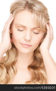 face and hands of worried woman with long hair