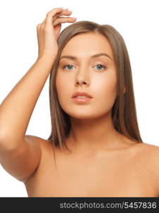 face and hands of worried woman with long hair