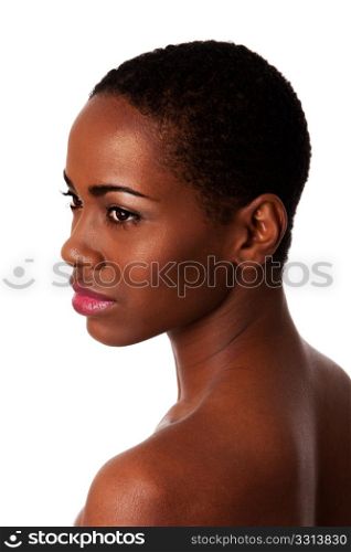 Face of a beautiful African woman with good smooth skin and short curly hair, isolated.