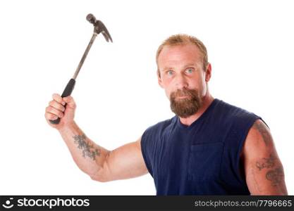 Face of a trong man with hammer in hand, isolated.
