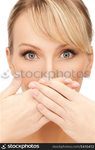 face of beautiful woman covering her mouth