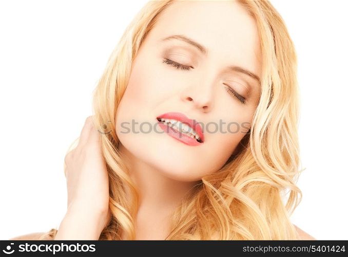 face of beautiful woman with long blonde hair