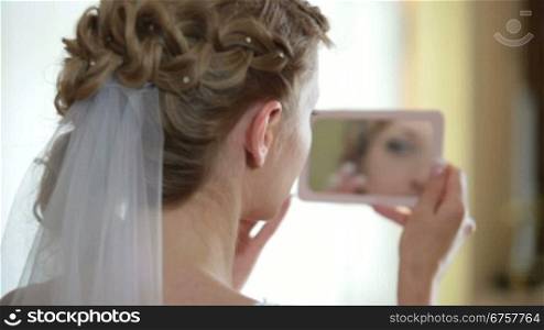 face of bride in mirror