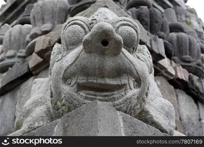 Face of demon in stone hindu temple in Prambanan, Indonesia