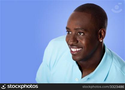 Face of handsome happy African American corporate business man smiling, wearing blue polo shirt, isolated.