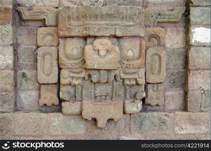 Face of mayan god - sculpture in Copan museum, Honduras
