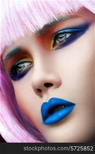 Face of woman with blue lips close-up