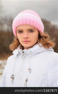Face of young beauty girl outdoor in winter