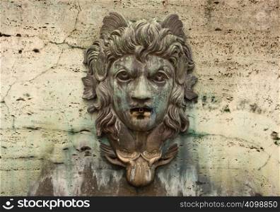 Face on a Water Fountain with Patina