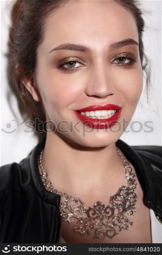 Face portrait of smiling woman. Teeth smiling girl. One model portrait on white background.