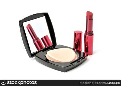 face powder and lipstick isolated on a white