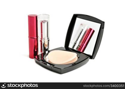 face powder and lipstick isolated on a white background