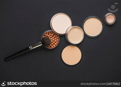 face powder bronzing pearls makeup brush black surface