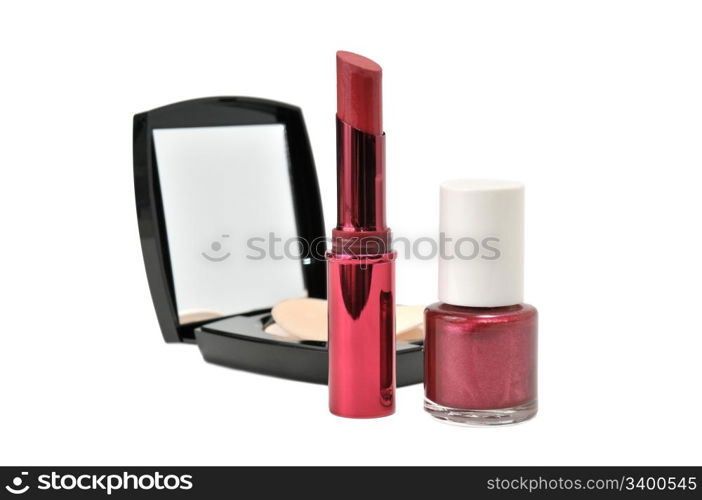 face powder, lipstick, enamel isolated on a white