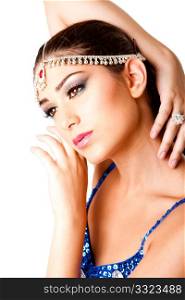 Face with hands of a beautiful Middle Eastern Egyptian Israeli Lebanese Turkish Arabic woman with makeup in the Belly Dancer style, isolated.