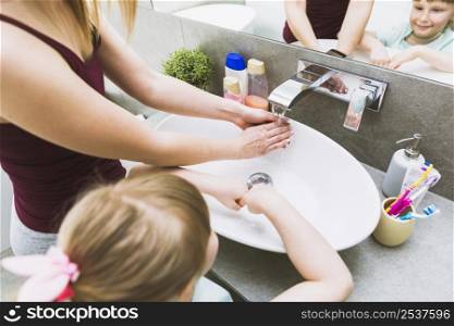 faceless girl woman washing hands