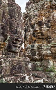 Faces of Buddha in Bayon temple in The Angkor Wat, Cambodia