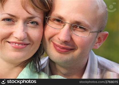 faces of happiness man and woman. man and woman are cuddling
