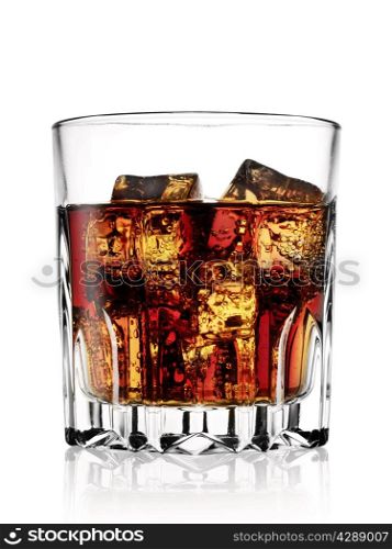 Faceted glass with cold cola isolated on white background