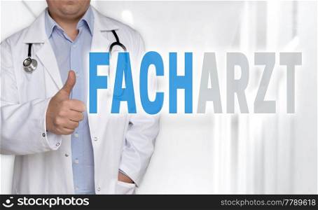 Facharzt (in german Specialist) concept and doctor with thumbs up.. Facharzt (in german Specialist) concept and doctor with thumbs up