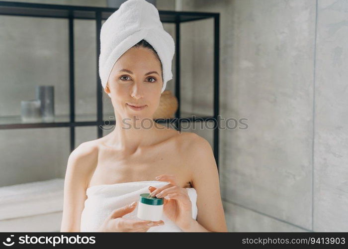 
Facial cream ad: European lady applies cream, attractive girl with towel and cream jar, happy woman showers at home.