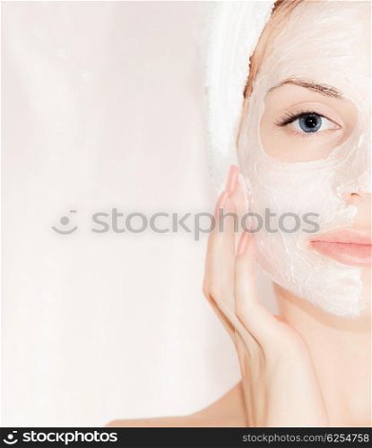 Facial mask on beautiful face, closeup portrait on female with perfect skin, woman taking care, spa health and beauty treatment, body part