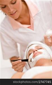 Facial mask - Woman at beauty treatment at luxury spa