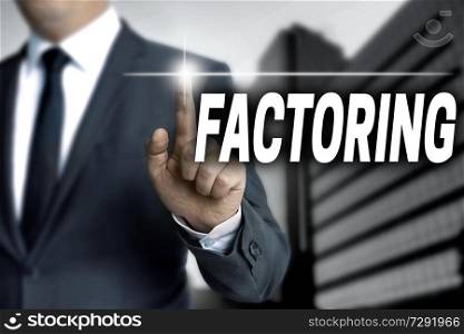 Factoring touchscreen is operated by businessman.. Factoring touchscreen is operated by businessman