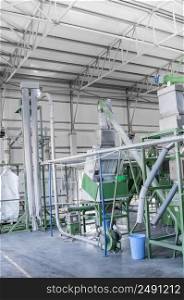 factory equipment for processing and recycling of plastic bottles. PET recycling plant. a plant for recycling bottles