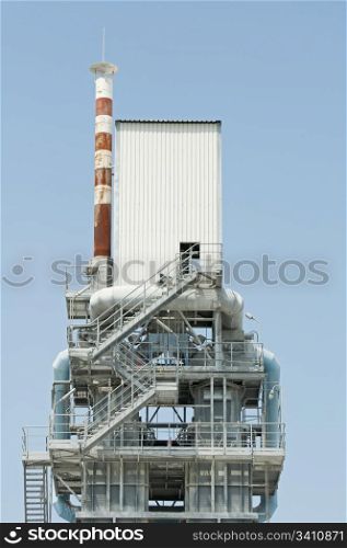 Factory for production of asphalt. Vertical image