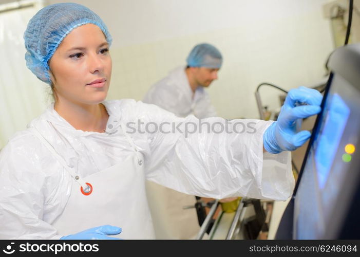 Factory operative using computer