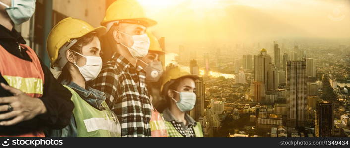 Factory workers with face mask protect from outbreak of Corona Virus Disease 2019 or COVID-19.