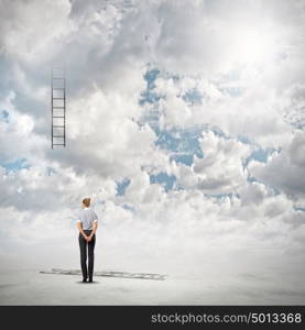 Failure in business. Back view of businesswoman and broken ladder in sky