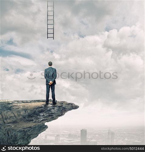 Failure in business. Rear view of businessman and broken ladder going up