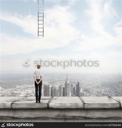 Failure in business. Rear view of businesswoman and broken ladder to sky