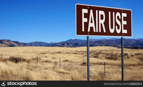 Fair use word on road sign and blue sky