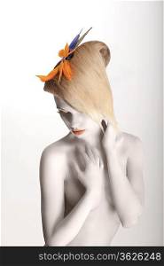 Fairy Tale. Artistic Dreamy Woman with Strelitzia Flower posing. White Makeup