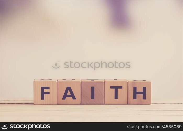 Faith sign made of wood in matte tones