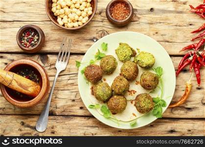 Falafel deep-fried balls made from chickpeas.Fresh vegetarian falafel. Falafel balls,vegetarian dish