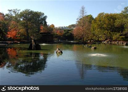 Fall colors on a lake, Auburn Botanic Garden, Sydney, New South Wales, Australia