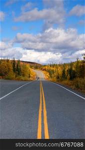 Fall comes to the Alaska Highway System of transportation with saturated yellow