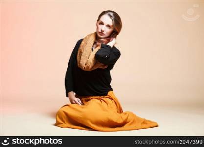 fall. fashion woman in autumn color fresh girl in full length long false orange eye-lashes