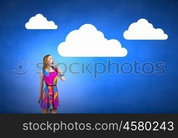 Fall in love. Young surprised romantic woman in multicolored dress
