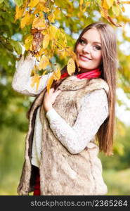 Fall lifestyle concept, harmony freedom. Attractive young woman fashion girl long hair relaxing walking in autumnal park, outdoor