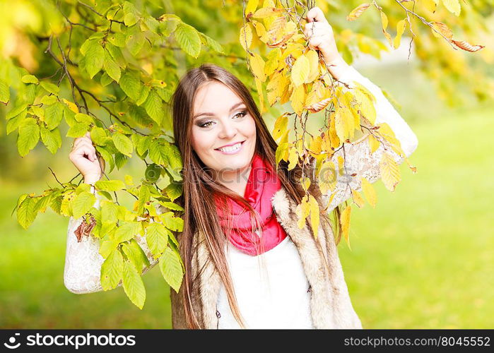 Fall lifestyle concept, harmony freedom. Attractive young woman fashion girl long hair relaxing walking in autumnal park, outdoor